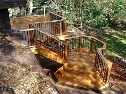 This house does the opposite. Cedar Deck Photos 4 Quarters Design Build