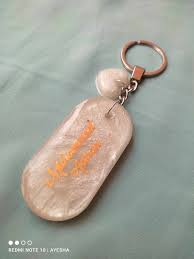 Custom keychain with pearly finish and personal touch recommended