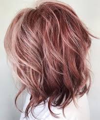 Dark brown hair with warm highlights. 20 Hottest Red Hair With Blonde Highlights For 2020