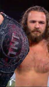 TNT Champion Jack Perry @boy_myth_legend put his opponent & the TNT Title  in a body bag during #AEWCollision!