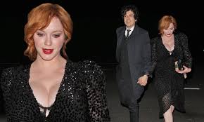 Christina Hendricks puts on an eye-popping display in shimmering black  frock | Daily Mail Online