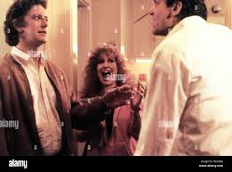 RUTHLESS PEOPLE (1986) JUDGE REINHOLD, BETTE MIDLER, J E FREEMAN RUP 001FOH  Stock Photo - Alamy