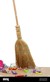 Broom Sweep The Trash After A Party On White Background Close Up Stock Photo Alamy