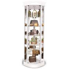 Curio cabinets and displays can help keep your favorite keepsakes securely locked away behind glass doors that will still let them shine as decorative accents to any room. Philip Reinisch Lighthouse Curios Auburage Iv Curved Corner Cabinet With L E D Lighting Darvin Furniture Curio Cabinets