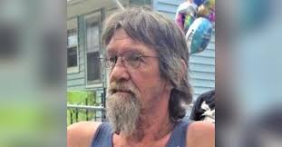 Mr. John E. White Obituary