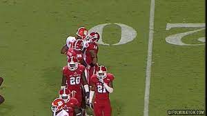 Gif Clemson S Isaiah Battle Ejected For Uppercut Punch To Nc State Player Football Football Gear College Football