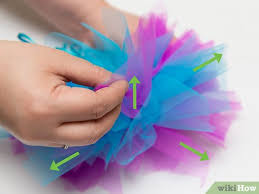 This craft has been super popular since i first published it in 2016, and i've had lots of questions about measurements and requests for a template. How To Make Tulle Pom Poms With Pictures Wikihow