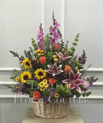 Can sympathy flowers be colorful. Sympathy Of Colors Basket By Calvary Flower Shop