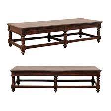 A coffee table bench is a furniture piece usually made of wood that is designed for setting food and other items on as well as to use for extra seating. A Beautiful Pair Of 6 Ft Rosewood Coffee Tables Or Benches From Kerala India At 1stdibs