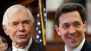 Man held over photo of senator's bedridden wife