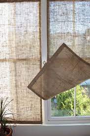 The Shingled House Diy Easy Burlap Shades For Less Than 20 Each Remodelista Diy Window Treatments Diy Window Easiest Burlap