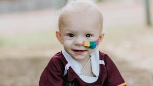 Young boy helps other sick kids by raising awareness with local billboard. 