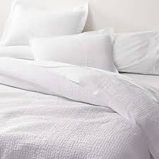 Give your sleep suite a stylish finishing touch with this nina quilt set from vcny home. Quilts Coverlets Free Shipping Crate And Barrel