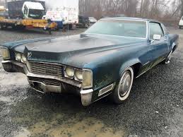 Image result for Black 1969 Cadillac