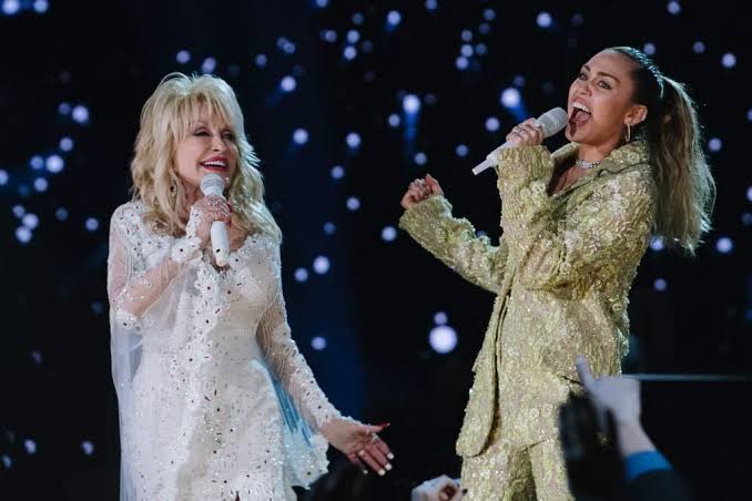 Dolly Parton to Re-release 'Light of a Clear Blue Morning' Featuring Miley Cyrus and More - Backstage Country