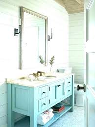 Polished edge bath mirror features sleek, polished edges and a classic frameless design. Beach Themed Bathroom Cabinets 2021 Beach Bathroom Decor Beach Bathrooms Coastal Bathroom Decor