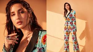 She was born in canada and is a canadian by nationality. Nora Fatehi Looks Ridiculously Hot In This Sequinned Pantsuit With Plunging Neckline See Glamorous Ph Latestly
