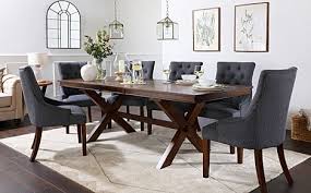 Uniformly minimal kitchen features smooth dark wood cabinets and shelving in an expanse of natural hardwood flooring. Dark Wood Dining Sets Dining Room Furniture Furniture And Choice