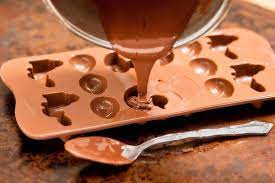 Interested in using silicone baking molds? How To Make Chocolate Molds Shiny Ehow Chocolate Molds Recipe Chocolate Candy Recipes Candy Molds Recipes