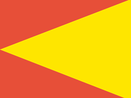 Flag waving in the wind in sunny day. Yellow Blue Red Flag Horizontal
