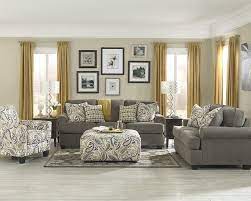 Straight lines and gentle curves dressed in simple neutrals give a timeless appeal that can weather a variety of fashion changes in your living room arrangement. Ashley Furniture Living Room Sets Wild Country Fine Arts