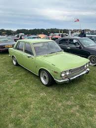 Image result for Apple Green 1959 Datsun