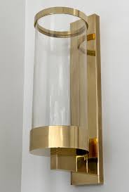 Pair of antique hurricane shade wall sconces. Pair Of Chapman Brass And Glass Candle Wall Sconces At 1stdibs