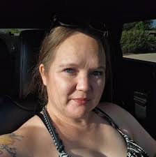 Can someone darken and sharpen this photo of my deceased sister for her  obituary?