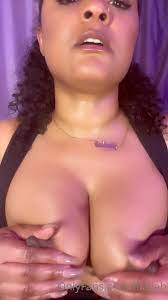 Maliah Michel playing with her tittys