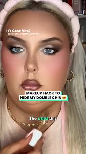Using Makeup To Hide Her Double Chin