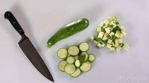 If cutting the zucchini into small cubes, begin by first cutting the zucchini in half lengthwise. Slicing Zucchini Myrecipes