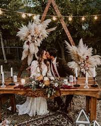 Pampas grass wedding table decor. Boho Pampas Grass Wedding Sweetheart Table Decor1 Wedding Weddings Weddingideas Bohemian Sweetheart Table Wedding Bohemian Wedding Flowers Grass Wedding