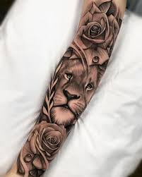 Lion tattoos looks great on both men and women and is a great way to express kingship, dominion, and other cool meanings associated with. Art Amazing Lion Roses Arm Tattoo By Awesome Artist