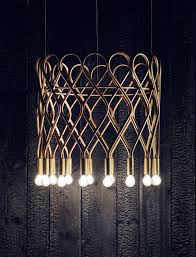 This beautiful ceiling light offers a perfect illustration of the current organic fluid, essential design that is inspired by scandinavian design in the 60s. Swedish Design Ceiling Light Made Of Brass With 16 Burners Casa Lumi