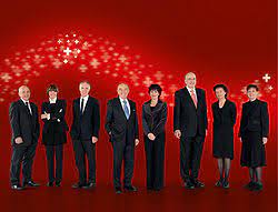 Im hintergrund ist das parlamentsgebäude aus der vogelperspektive zu sehen. Bundesratsfoto Wikipedia