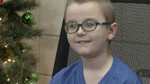 Boy gets wish of being Santa's helper before he goes blind
