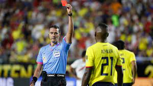 Here he gets his fifa badge from his mother. Controversial Colombian Referee Wilmar Roldan Hogs Tunisia England Limelight Goal Com