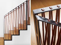 A Stair Railing Made From Steel And Leather Gives A Modern Industrial Look To This Home In 2020 Modern Stair Railing Industrial Stairs Railing Stair Railing
