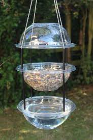 19 Diy Bird Feeders To Keep Your Colorful Feathered Friends Happy Homemade Bird Feeders Bird Feeders Diy Bird Feeder