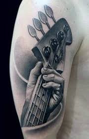 Guitar Tattoo Men S Designs Ideas Guitar Tattoo Design Music Tattoo Designs Tattoos For Guys