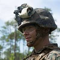 Pfc. Christina Fuentes Montenegro prepares to hike