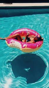 Pool Floats For Adults Have Become A Summer Essential This Pink Donut Pool Float Is Making Us Dream Summer Pictures Summer Instagram Summer Instagram Pictures