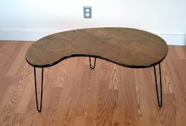 Modeled after an original design, this table has the same sleek lines from the atomic era. Kidney Bean Coffee Table Lunar Lounge
