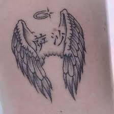 It's not that much to look at really as far as the design is concerned but what it lacks in. Small Angel Wings With Halo Tattoos Tattoo Ideas