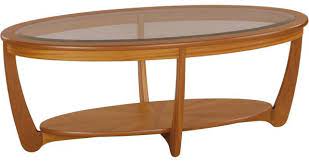 This kind of says something about our nature of entertainment along with the put it back went through over the years, right? Nathan Glass Top Oval Coffee Table Teak Coffee Tables Hunter Furnishing
