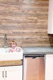 Laminate Flooring Backsplash It Looks Like Wood Bower Power Flooring Flooring On Walls Plywood Flooring