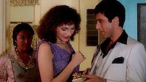 The actress' movie wardrobe was rife with plunging necklines, languid silhouettes, flimsy straps and silky materials. Film Intuition Review Database The World Is Tony S A Scarface Essay 4k Uhd Blu Ray Review Of Scarface 1983 The World Is Yours Limited Edition Set