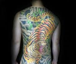 Japanese tiger tattoos have a particular art style that reflects the history of the great beast in ancient japanese culture. 70 Japanese Tiger Tattoo Designs For Men Masculine Ideas