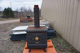 Looking for the web's top earth stove sites? The Earth Stove 100 Series Model 3340 Wood Burning Stove Furnace Chevy Duramax Challenger 5th Wheel Travel Trailer Boss Plow Wood Burning Furnace K Bid