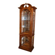 Small lights mounted beneath the top of a curio cabinet benefit a cabinet with a mirrored back wall and clear glass shelves. Vintage Two Door Lighted Traditional Style Curio Cabinet Glass Shelves In Bathroom Cabinet Floating Glass Shelves